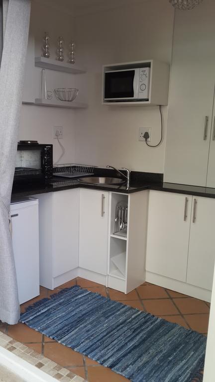 On Broadwalk Cottage Kaapstad Kamer foto